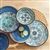 12-Piece Melamine Dinnerware Plates Bowls Set with Blue Floral Pattern